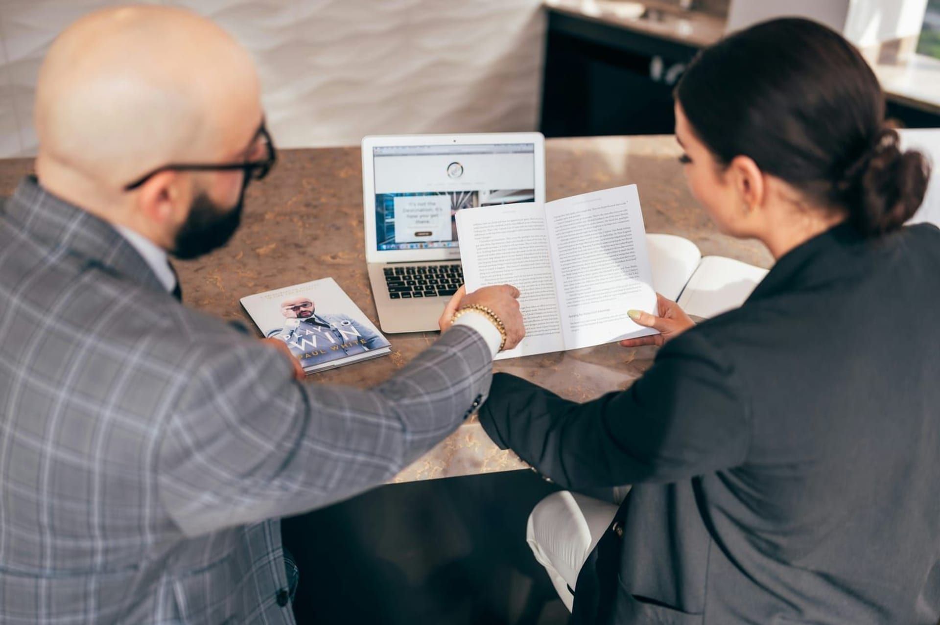 A workers' comp attorney listening to a client